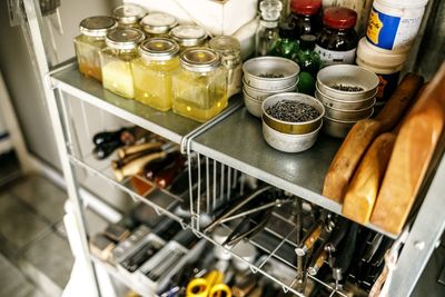 High angle view of bottles in kitchen