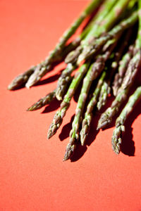 Close-up of fresh asparagus on table