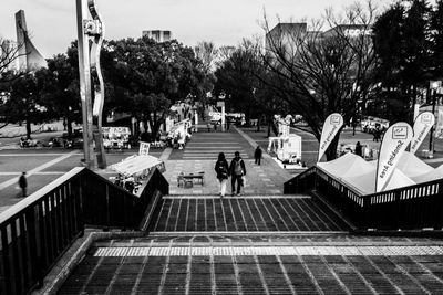 View of people walking on road
