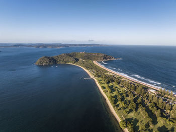 Drone view of palm beach and barrenjoey head and lighthouse, northern beaches, sydney, australia.