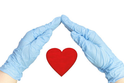 Close-up of heart shape over white background