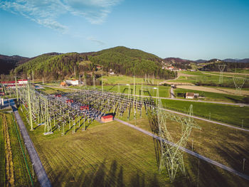 Scenic view of agricultural field against sky