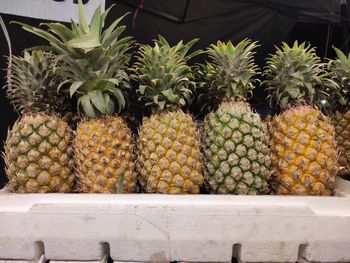 Stack of fruits for sale at market stall