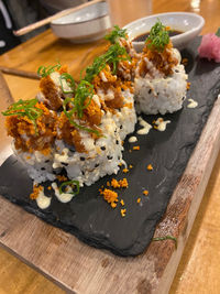 Close-up of sushi on cutting board