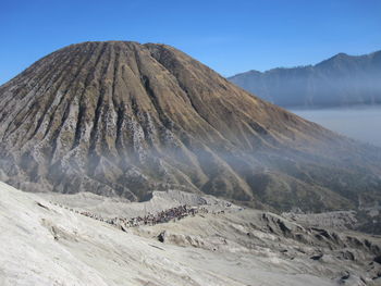 Panoramic view of volcanic landscape against clear sky