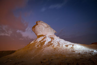 Scenic view of rocks against sky