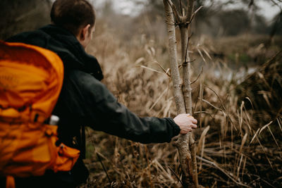 Man exploring the itchen river, hampshire uk in winter