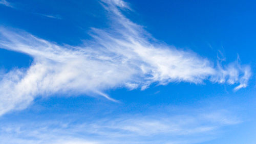 Low angle view of clouds in blue sky