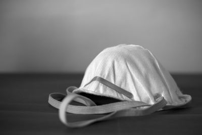 Close-up of hat on table