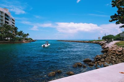 Scenic view of sea against cloudy sky