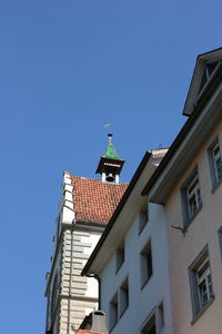 Low angle view of building against blue sky