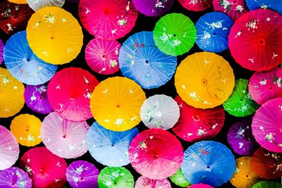 Low angle view of multi colored umbrellas