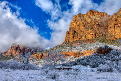 Scenic view of snow covered mountain against sky