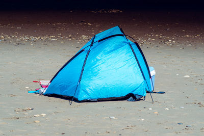 Blue tent on beach