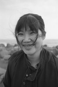 Portrait of young woman at beach