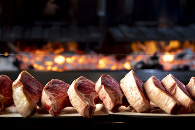 Close-up of meat on barbecue grill