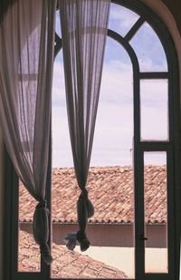 Buildings seen through window