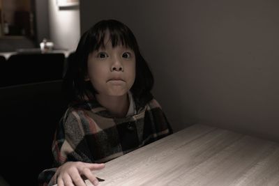 Portrait of cute girl at home