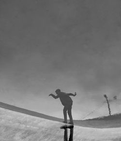 Man standing against sky