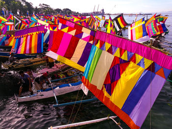 Clothes drying on clothesline against sky