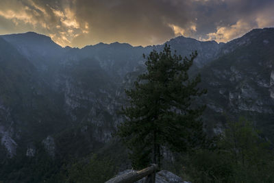 Scenic view of mountains against sky at night