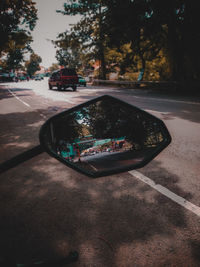 Close-up of car on street