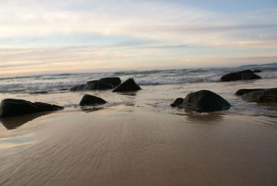 Scenic view of beach against sky