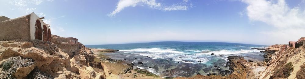 Panoramic view of beach against sky