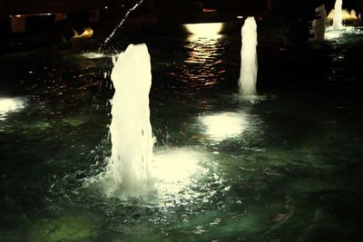 Scenic view of waterfall at night