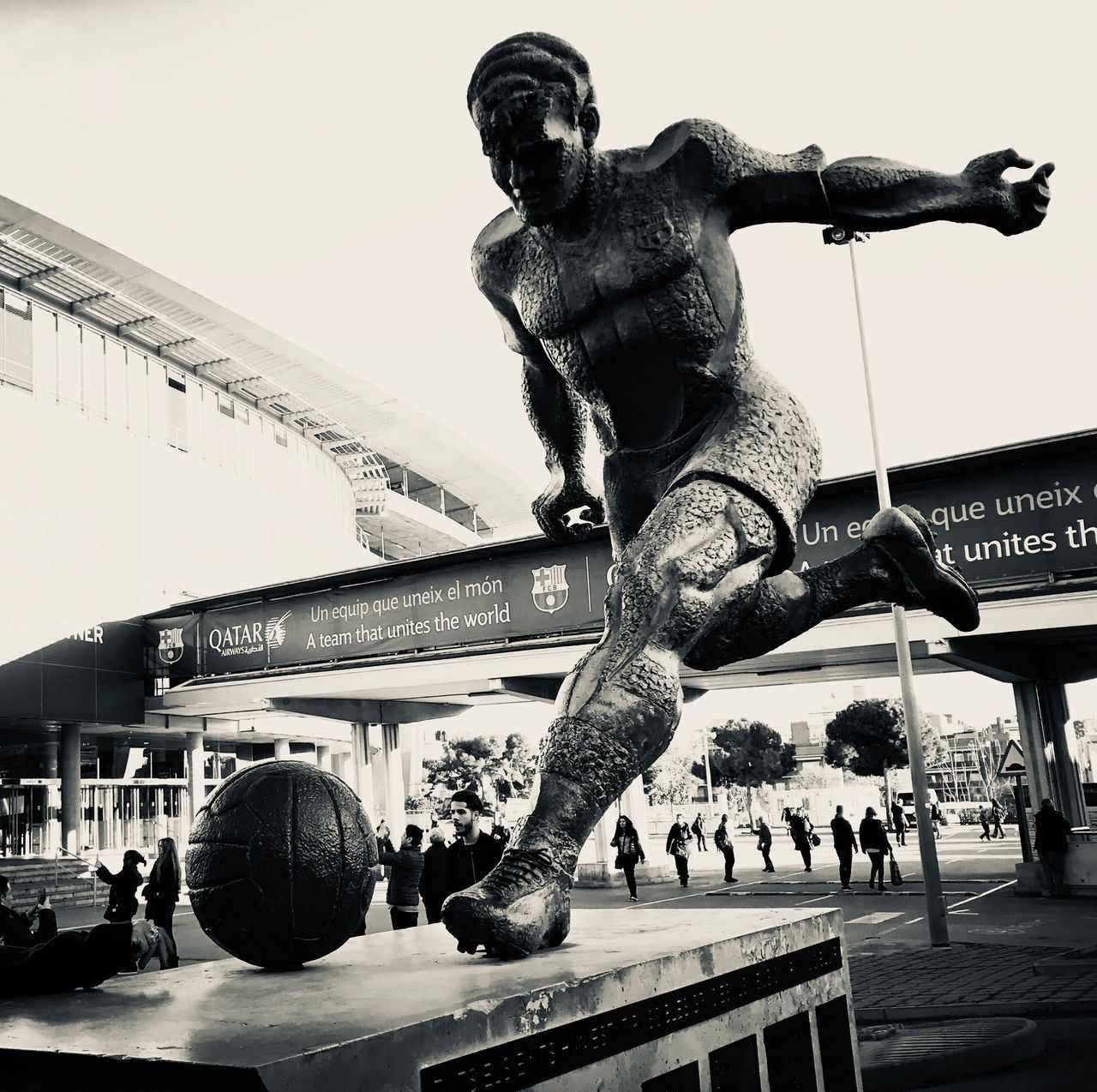 VIEW OF STATUE AGAINST BUILDINGS