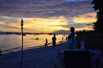 Scenic view of sea at sunset