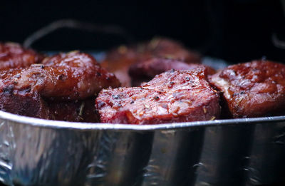 Close-up of meat on barbecue grill