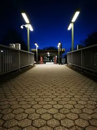 Illuminated street lights at night