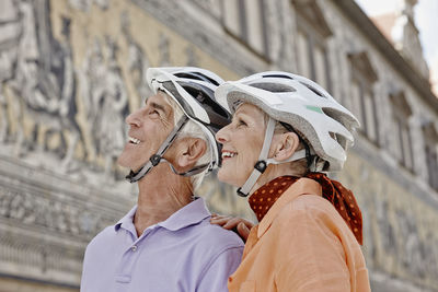 Portrait of couple kissing outdoors