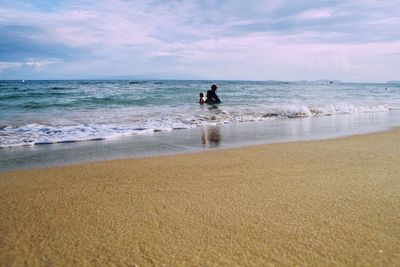 Scenic view of beach against sky