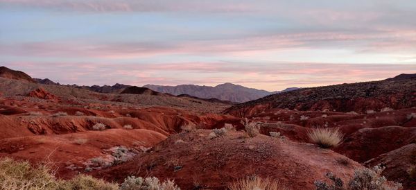 Scenic view of mountains against twilight