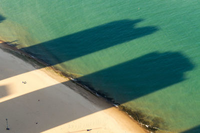 High angle view of shadow on green leaf