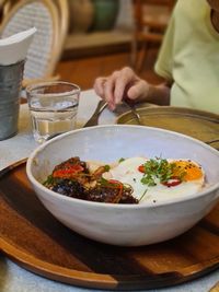 Midsection of man preparing food