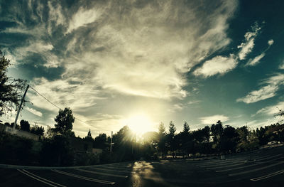 Scenic view of landscape against sky at sunset