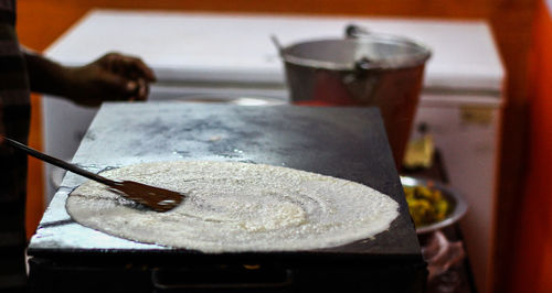 Close-up of dosa cooking pan in commercial kitchen