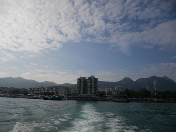 View of cityscape with mountain range in background