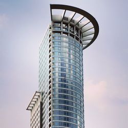 Low angle view of modern building against sky