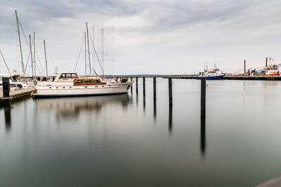 Long exposure of sailing boats moored in harbour. sassnitz is a small town located in rugen island