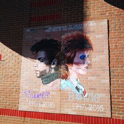 High angle view of graffiti on brick wall