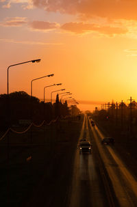 Sunset road with cars