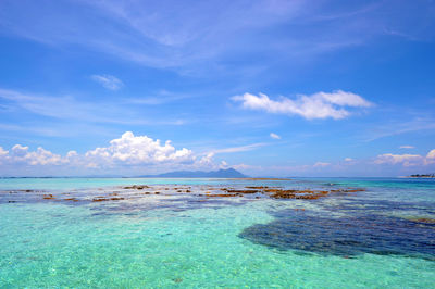 View of sea against cloudy sky