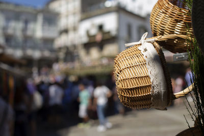 Close-up of wicker basket hanging in market