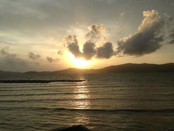 Scenic view of sea against sky during sunset