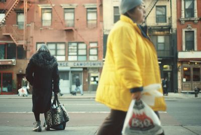 Woman standing in city