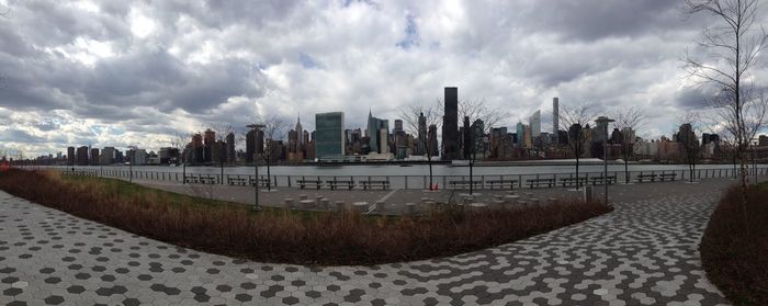 View of city against cloudy sky